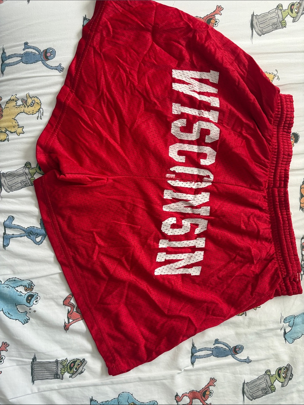 Red Athletic Shorts with 'WISCONSIN' Graphic